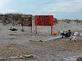 May 24, 2009 - Sandy Point State Reservation, Plum Island, Massachusetts.<br />Sign and guard at boundary with Parker River National Wildlife Refuge<br />(only during piping plover breeding season, April 1 to August 15).