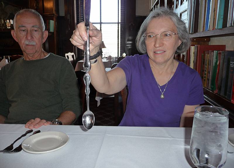 June 7, 2009 - Portsmouth, New Hampshire.<br />The Library Restaurant.<br />Ronnie and Joyce demonstrating the magnetism of the knife handle.