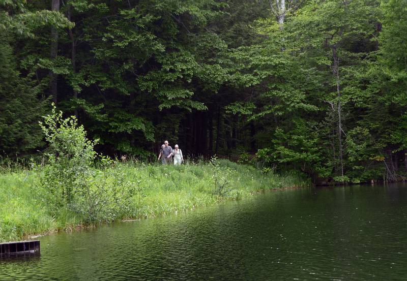 June 8, 2009 - Woodstock, Vermont.<br />Joyce, Ronnie, and Baiba returning from a walk aroung The Pogue.<br />(I didn't want to push my luck only five days after my hernia operation.)