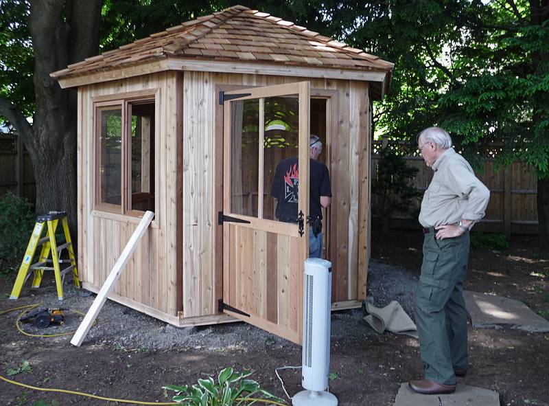 June 17, 2009 - Newburyport, Massachusetts.<br />John and carpenter working on John's new gazebo.