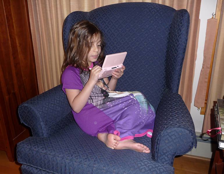 July 11, 2009 - Merrimac, Massachusetts.<br />Miranda playing with her virtual pet dogs.