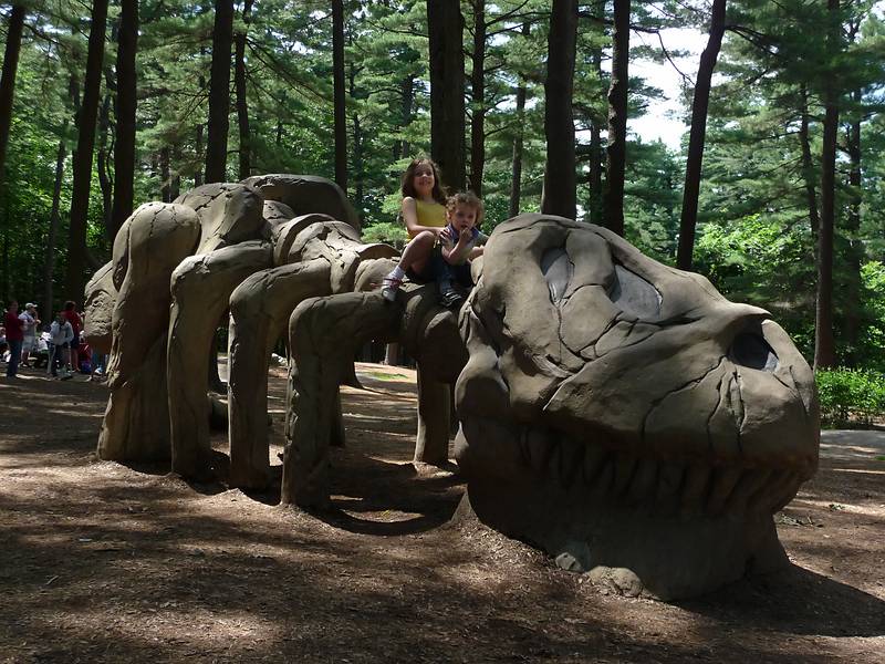 July 11, 2009 - Moseley Woods Park, Newburyport, Massachusetts.<br />Miranda and Matthew riding a dinosaur skeleton.