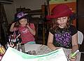 July 13, 2009 - Merrimac, Massachusetts.<br />Isabel, a neighbor's relative, and Miranda painting in Joyce's studio.