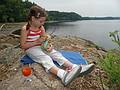 July 16, 2009 - Maudslay State Park, Newburyport, Massachusetts.<br />Miranda feeding her baby at our picnic stop along the Merrimack River.