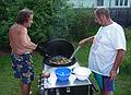 August 18, 2009 - At Marie's resort, Lawrence, Massachusetts.<br />Paul and Dominic tending the paella.