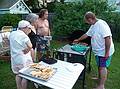 August 18, 2009 - At Marie's resort, Lawrence, Massachusetts.<br />Marie, Joyce, and Paul watch Dominic add shrimp to the paella.
