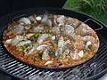 August 18, 2009 - At Marie's resort, Lawrence, Massachusetts.<br />Paella on the grill.