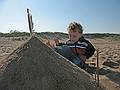 August 30, 2009 - Parker River National Wildlife Refuge, Plum Island, Massachusetts.<br />Matthew and cone of sand that he and I built.