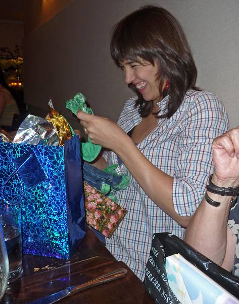 August 21, 2009 - Brooklyn, New York, New York.<br />At the Ici Restaurant.<br />Gisela unwrapping baby presents.