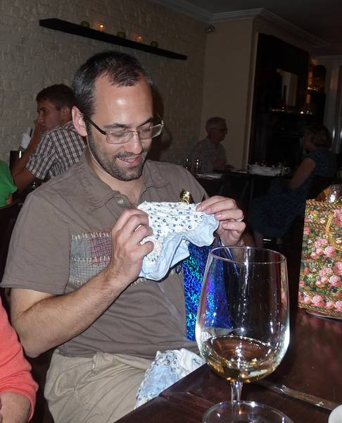 August 21, 2009 - Brooklyn, New York, New York.<br />At the Ici Restaurant.<br />Julian examining one of the baby presents.