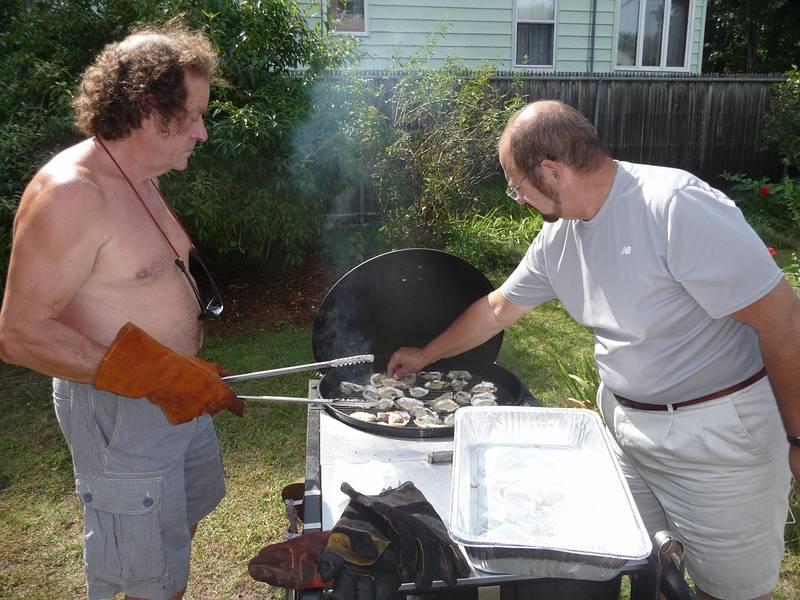 Sept 7, 2009 - At Marie's resort in Lawrence, Massachusetts.<br />Celebrating Paul L's retirement.<br />Paul G and Dominic grilling some oysters.