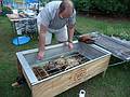Sept 7, 2009 - At Marie's resort in Lawrence, Massachusetts.<br />Celebrating Paul L's retirement.<br />Dominic inspecting the leg of lamb.
