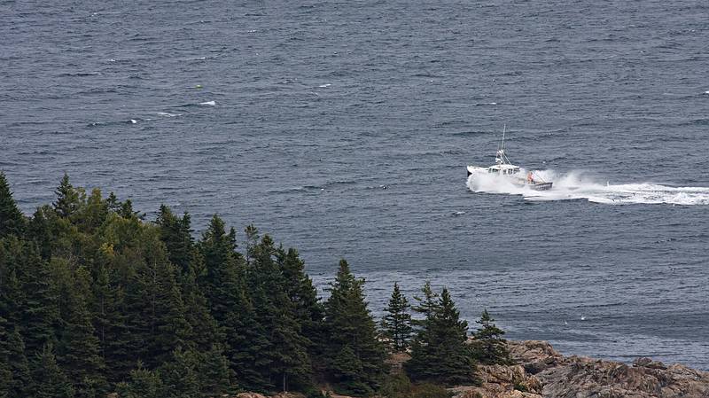 Sept. 25, 2009 - Gorham Mountain Trai, Acadia National Park, Maine.<br />Lobster boat motoring past Great Head.