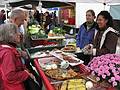 Oct. 31, 2009 - Waverly Farmers' Market, Barclay & E. 32nd Streets, Baltimore, Maryland.<br />Joyce and Ronnie at a smoked fish stand.