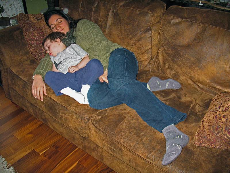 Dec. 26, 2009 - At Carl and Holly's in Mendon, Massachusetts.<br />Matthew just crawled up to Melody and went to sleep.