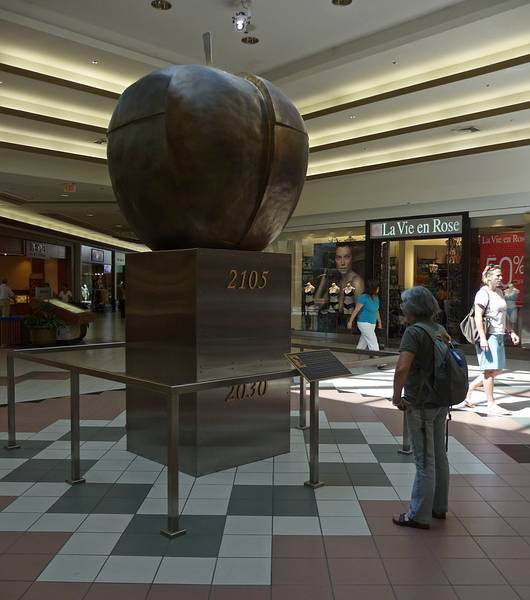 July 31, 2009 - Kelowna, British Columbia, Canada.<br />Joyce admiring a Geert Maas sculpture at a shopping mall.