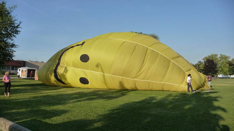 August 1, 2009 - Ballooning in Kelowna, British Columbia, Canada.<br />Smiley about to rise.