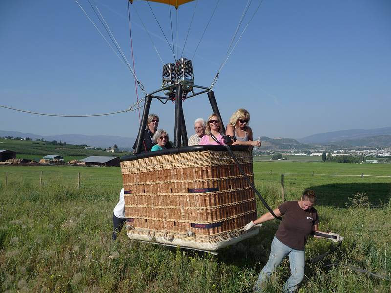 August 1, 2009 - Ballooning in Kelowna, British Columbia, Canada.<br />Well, almost. One final drag and push to get it closer to the path.