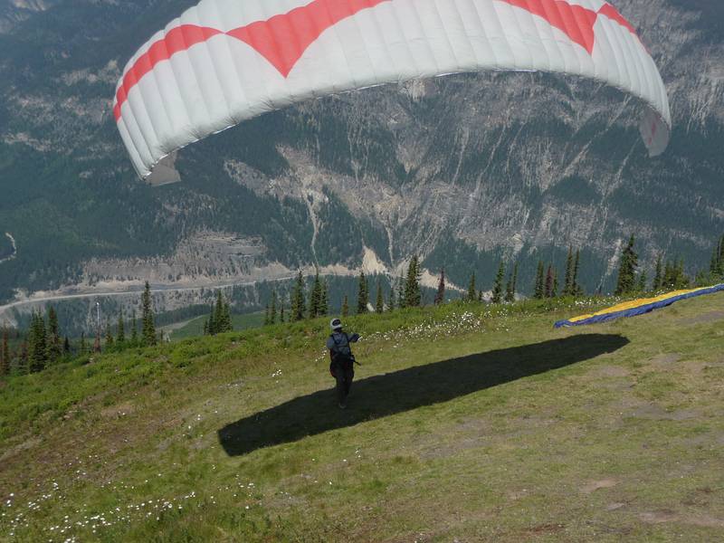 August 2, 2009 - Atop Mount Seven near Golden, British Columbia, Canada.<br />Sati preparing to launch (unfortunatly, the conditions became more active,<br />and he decided not to fly that day).