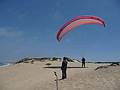 August 13, 2009 - Dunes State Park (on Monterey Bay), Sand City, California.<br />Melody and Sati kiteing his wing.