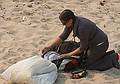 August 13, 2009 - Dunes State Park (on Monterey Bay), Sand City, California.<br />Melody packing up her gear.