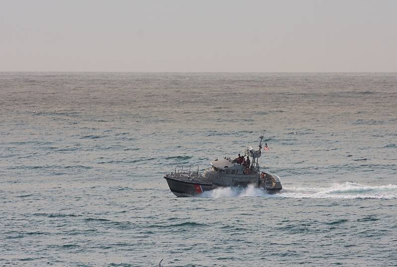 August 13, 2009 - Dunes State Park (on Monterey Bay), Sand City, California.<br />Coast Guard patrolling Monterey Bay.