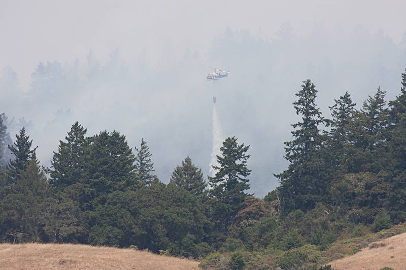 August 14, 2009 - Fighting a forest fire off CA-1 near Davenport, California.