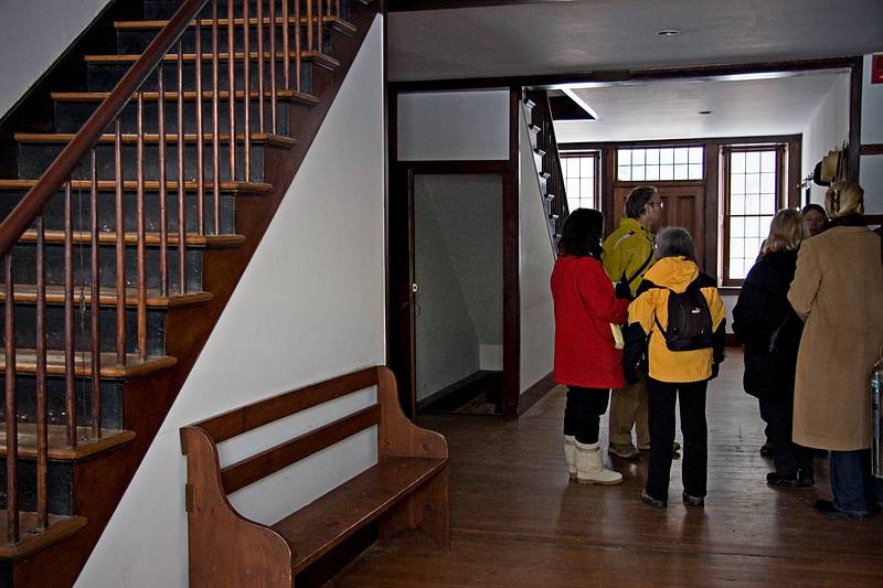 Jan. 10, 2010 - Hancock Shaker Village, Hancock, Massachusetts.<br />Joyce among the artists and staff.<br />Women's stairs and on the far side the men's stairs and men's entrance.