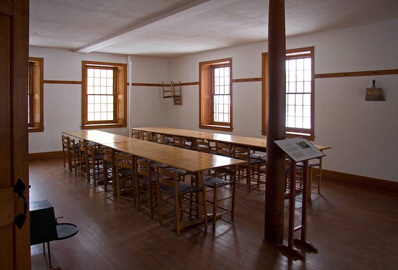 Jan. 10, 2010 - Hancock Shaker Village, Hancock, Massachusetts.<br />The men's side of the dining room in the Brick Dwelling.<br />The chairs fit under the table.
