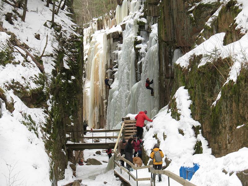 Feb. 15, 2010 - The Flume, Franconia Notch, New Hampshire.<br />Joyce (yellow), Nancy (dark pink), John H. (red), strangers and ice climbers in the gorge.