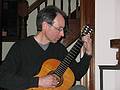 Oscar entertaining us with some Spanish music.<br />March 27, 2010 - Earth Hour party with a Spanish theme, Merrimac, Massachusetts.