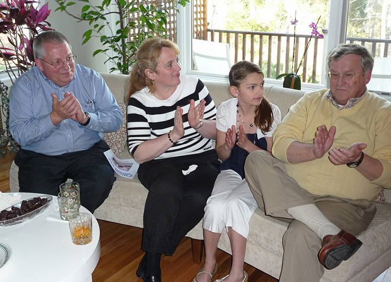 Vilnis, Iveta, Melisa, and Uldis applauding at the end.<br />Eriks' Eagle Scout promotion celebration.<br />April 3, 2010 - At John and Pricilla's in Newmarket, New Hampshire.
