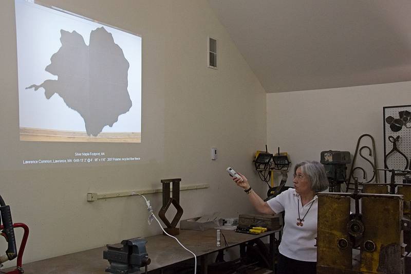 Joyce ginving her 'Footprints' presentation.<br />New England Sculptors Association gathering.<br />May 1, 2010 - Merrimac, Massachusetts.