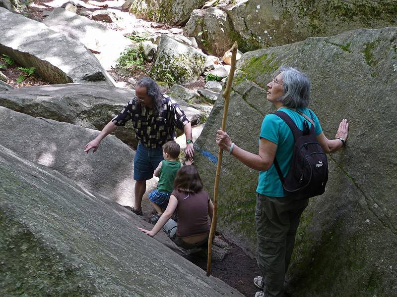 May 30, 2010 - Purgatory Chasm, Sutton, Massachusetts.<br />Carl showing Matthew and Miranda the path through the chasm while Joyce is enjoying the scenery.