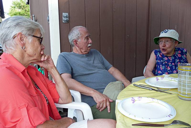 Baiba and Ronnie listening to one of Marie's stories.<br />June 25, 2010 - At Marie's in Lawrence, Massachusetts.