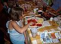 Miranda preparing her pizza before it is baked in the oven.<br />Matthew's 4th birthday celebration.<br />June 27, 2010 - Pizzeria Uno in Bellingham, Massachusetts.
