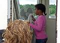 One of the schoolkids aboard taking a turn at the helm.<br />A boat tour out of Alexandria Bay.<br />June 10, 2010 - Thousand Islands Region of New York State.
