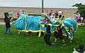 Dragon from nearby town of Nobel.<br />Dragon boat festival.<br />June 12, 2010 - Parry Sound, Ontario, Canada.