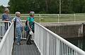 Ronnie, Baiba, and Joyce atop the lock gates.<br />Canadian locks connecting Lake Superior and Lake Huron.<br />June 13, 2010 - Sault Ste. Marie, Ontario, Canada.