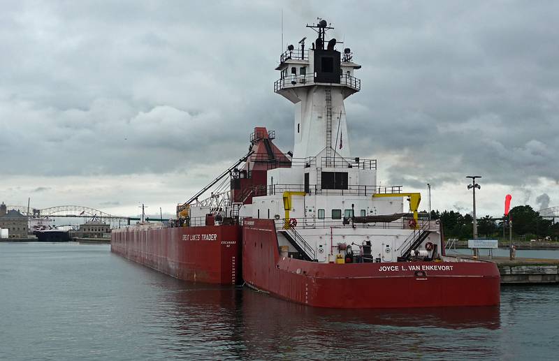 Great Lakes barge and its tug boat waiting to enter the locks.<br />Soo Locks boat tour.<br />June 14, 2010 - Sualt Ste. Marie, Michigan.