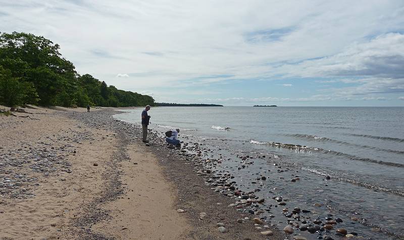 Joyce in the distance, Ronnie and Baiba.<br />June 14, 2010 - On the shore of Lake Superior at Point Iroquios, Michigan.