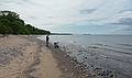 Joyce in the distance, Ronnie and Baiba.<br />June 14, 2010 - On the shore of Lake Superior at Point Iroquios, Michigan.