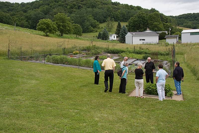 Sharon, Robert, Ronnie, Joyce, Baiba, Arnis, Inara, and Elga<br />checking out the garden.<br />June 20, 2010 - At Inara and Gene's in Barre, Wisconsin.