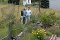 Zooming in on Baiba, Joyce, and Inara at the far end of the vegetable garden.<br />June 20, 2010 - At Inara and Gene's in Barre, Wisconsin.