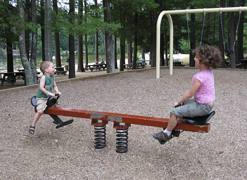 Matthew and Miranda on a seesaw.<br />July 13, 2010 - Camping at Pawtuckaway State Park, Nottingham, New Hampshire.