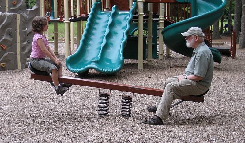 Miranda and Opa on the seesaw.<br />July 13, 2010 - Camping at Pawtuckaway State Park, Nottingham, New Hampshire.