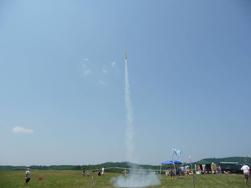 I managed to get this rocket in the frame.<br />A Central Massachusetts Spacemodeling Society (CMASS) event.<br />July 17, 2010 - Woodsom Farm, Amesbury, Massachusetts.