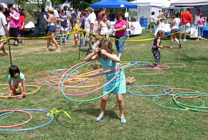 Miranda with four hoops. At one point, she was doing ten hoops.<br />July 25, 2010 - Yankee Homecoming, Newburyport, Massachusetts.