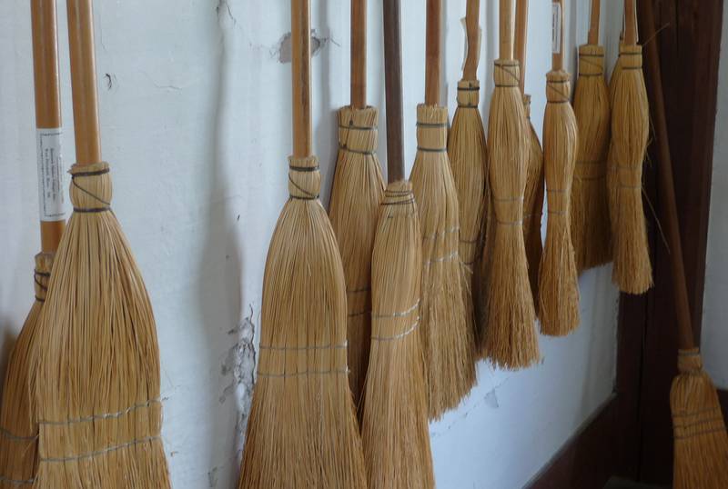 Broom making in the Brethren's Shop.<br />August 2, 2010 - Hancock Shaker Village, Massachusetts.