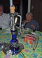 Marie trying out the hookah.<br />Sept. 5, 2010 - At Marie's in Lawrence, Massachusetts.